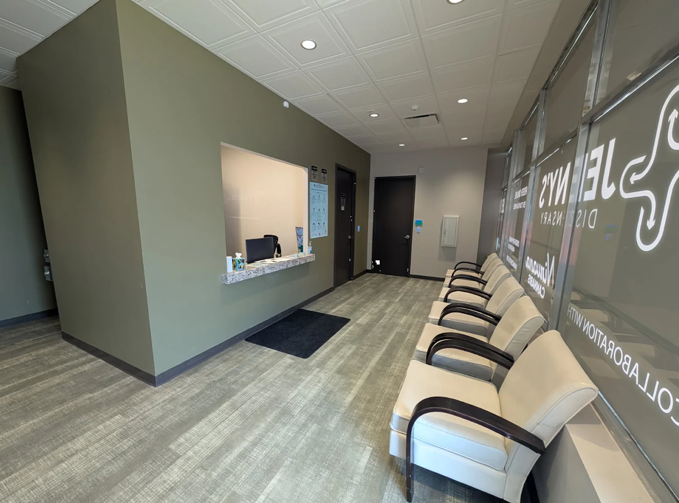 The lobby and check-in area at Jenny's Dispensary